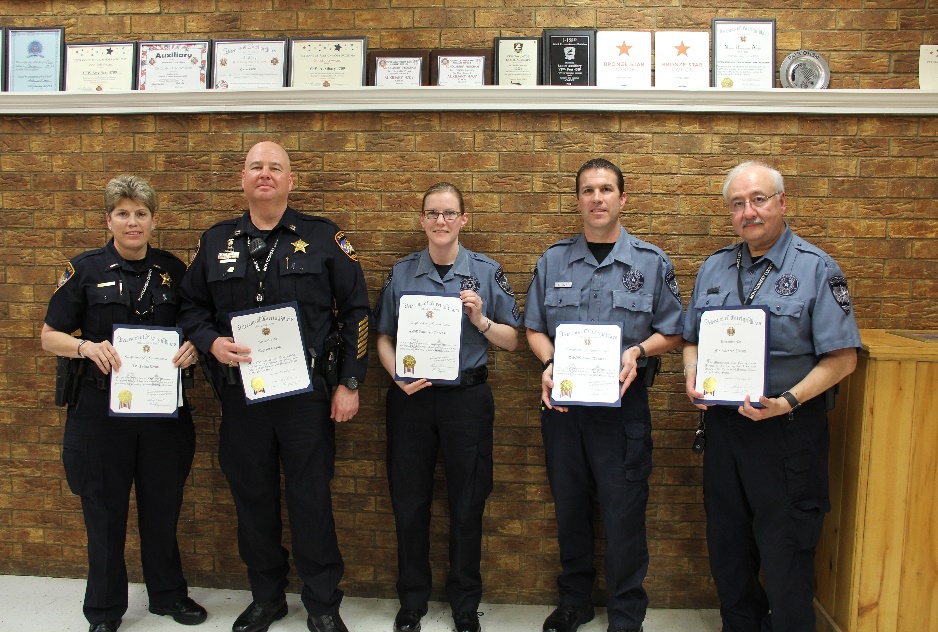 Photo of Lieutenant Felicia Webb, Captain Andy Eason, Detention Sergeant Kimberly Davis, Detention Officer Jason Turner and Detention Officer Ricardo Uresti holding their certificates of appreciation from the VFW Post 4709.